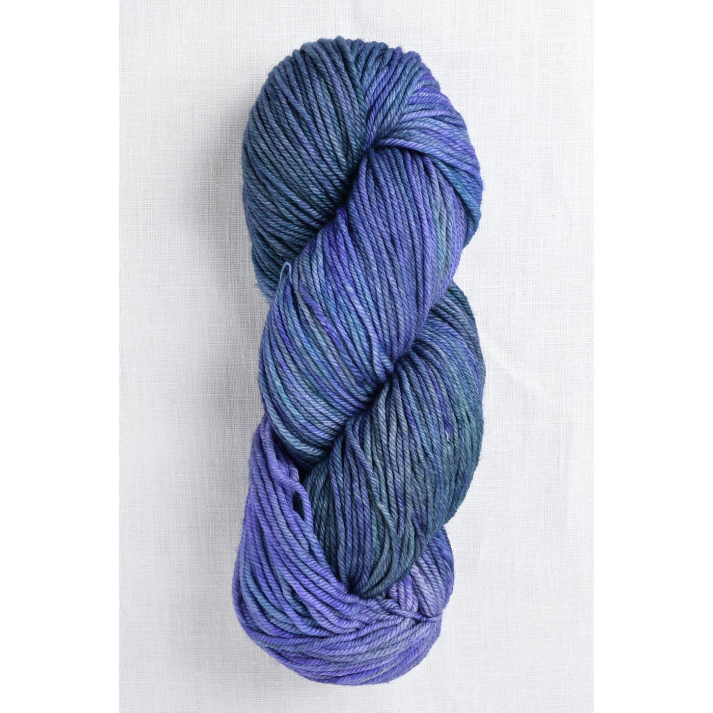Blue skein of yarn on a white background