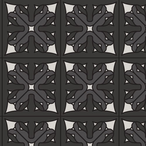 A swatch of Wright Prisms Charcoal fabric with a geometric pattern in black and gray tones.