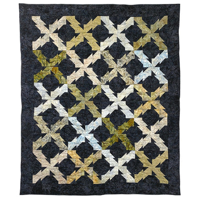 Geometric patterned quilt with black background