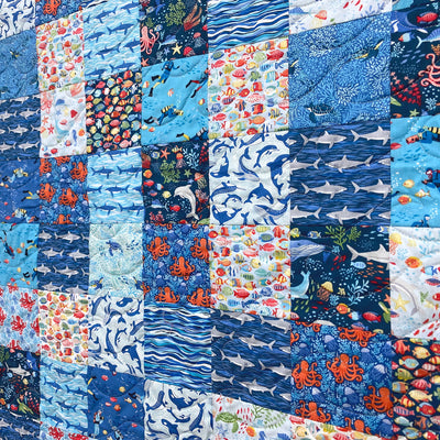 Deep Blue Sea 4 1/2" Roll Precut - 16 Strips